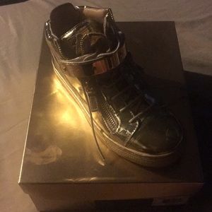 Designer kid Giuseppe gold in color worn twice